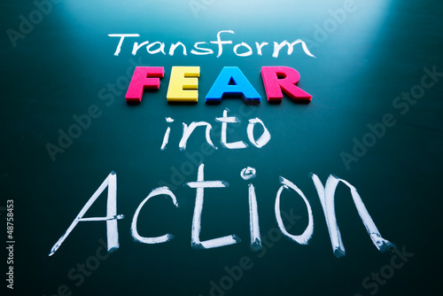 Photo: Transform fear into action concept Transform fear into action concept