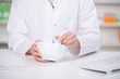 Photo: apothekerin mit mörser apothekerin mit mörser