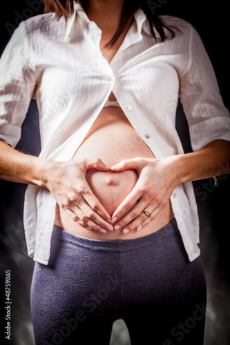 Photo: Pregnant woman's belly Pregnant woman's belly