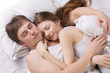 young husband and  wife sleepping