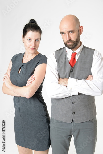 Photo: Skeptische Geschäftsleute Skeptische Geschäftsleute
