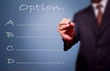 business man writing option list.