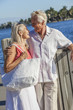 Happy Senior Couple Walking Tropical Sea or River
