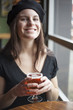 Young Woman Drinking Inda Pale Ale
