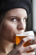 Young Woman Drinking Inda Pale Ale