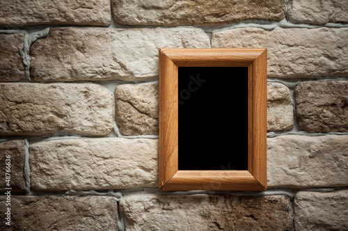Photo: photo frame on brick wall photo frame on brick wall