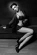 Photo: Beautiful Sexy Woman on a Couch Beautiful Sexy Woman on a Couch