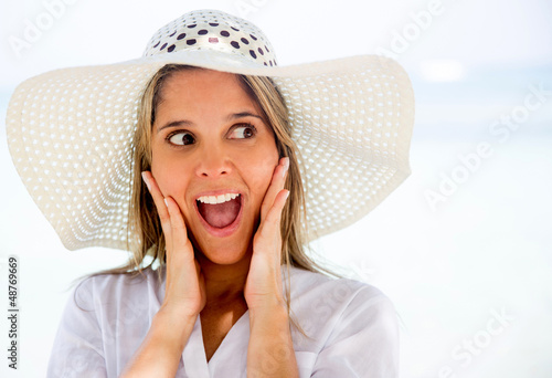 Photo: Surprised woman on holidays Surprised woman on holidays