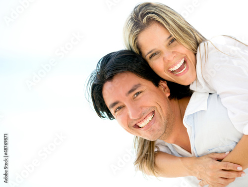 Photo: Beautiful couple looking happy Beautiful couple looking happy
