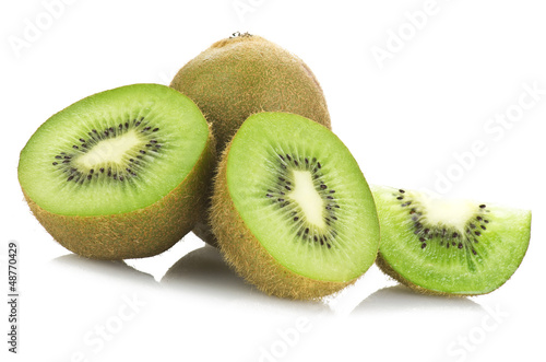 Photo: kiwi fruit and his sliced close up on white kiwi fruit and his sliced close up on white