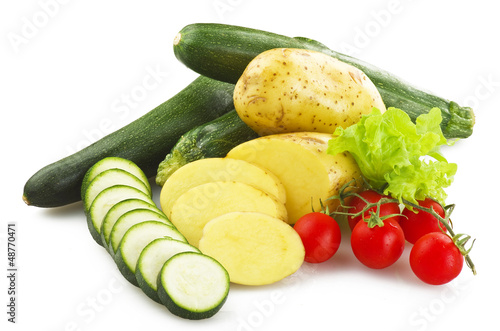 Photo: fresh vegetables close up on the white background fresh vegetables close up on the white background