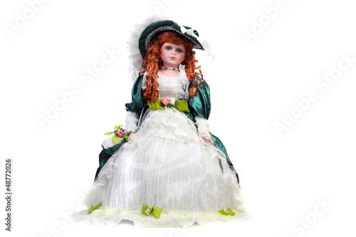 Photo: Isolated red-haired doll Isolated red-haired doll