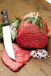 Raw beef on wooden table