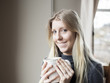 Photo: Young Woman Drinking Coffee Young Woman Drinking Coffee