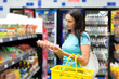 A woman buys eggs