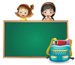 Smiling kids and a green board