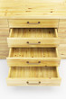 Illustration: cupboard with opened drawers cupboard with opened drawers