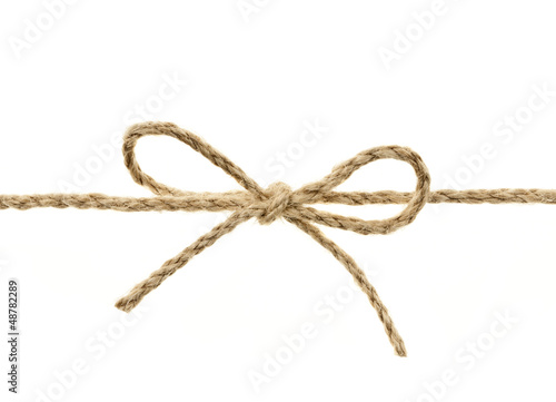 Photo: String tied in a bow String tied in a bow