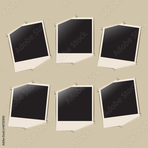 Vector: retro photo frames on album background retro photo frames on album background