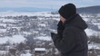 Video: Young woman freezes watching her village, winter time Young woman freezes watching her village, winter time