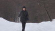 Video: Young woman walking near to forest, winter time Young woman walking near to forest, winter time