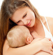 Mother breast feeding her infant