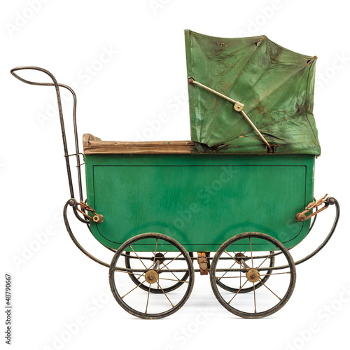 Photo: Nineteenth Century baby pram isolated on white Nineteenth Century baby pram isolated on white