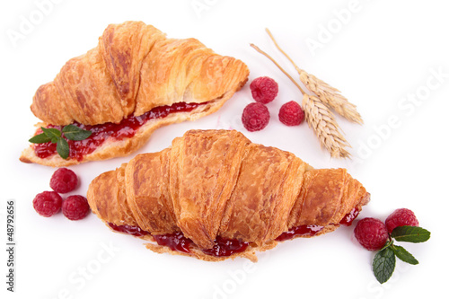 Photo: isolated croissant with berries isolated croissant with berries