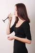sexy woman in dress and glass of wine