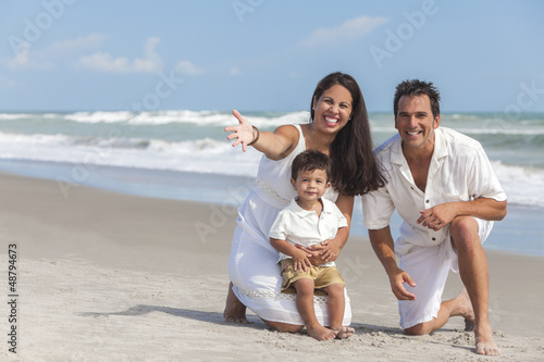 Photo: Mother, Father & Boy Child Family Having Fun At Beach Mother, Father & Boy Child Family Having Fun At Beach