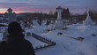 Video: Young woman rest in cemetery during winter time Young woman rest in cemetery during winter time