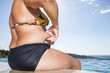 Pinching stomach fat