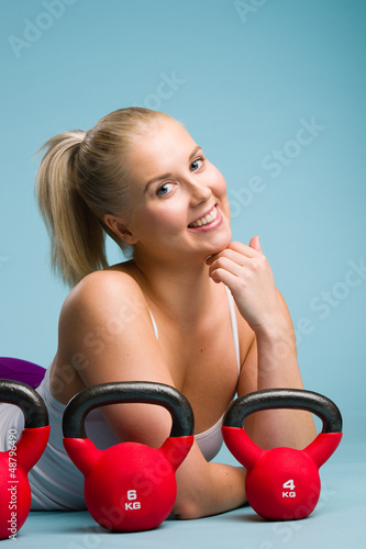 Photo: Girl and kettlebell Girl and kettlebell