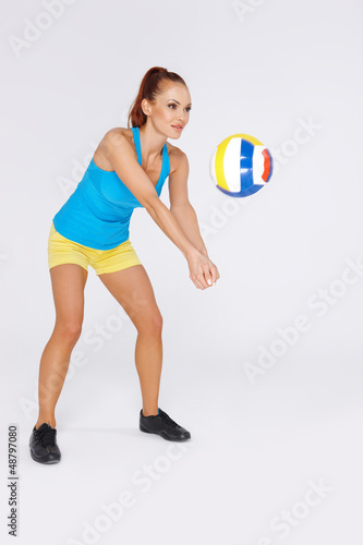 Photo: Woman playing volleyball Woman playing volleyball