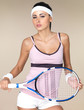 Attractive woman with a tennis racquet