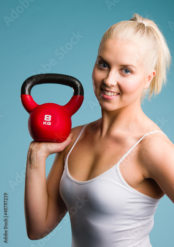 Photo: Girl and kettlebell Girl and kettlebell