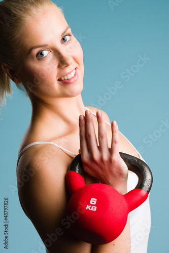 Photo: Girl and kettlebell Girl and kettlebell
