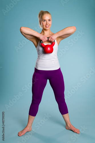 Photo: Girl and kettlebell Girl and kettlebell
