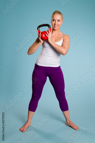 Photo: Girl and kettlebell Girl and kettlebell
