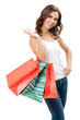 Young happy woman with shopping bags, isolated