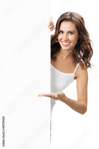 Photo: Beautiful young woman with blank signboard Beautiful young woman with blank signboard