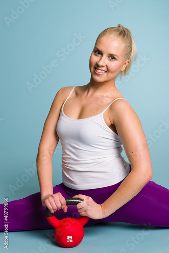 Photo: Girl and kettlebell Girl and kettlebell