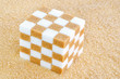 Cube of brown and white sugar cubes