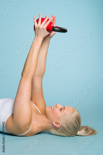 Photo: Girl and kettlebell Girl and kettlebell