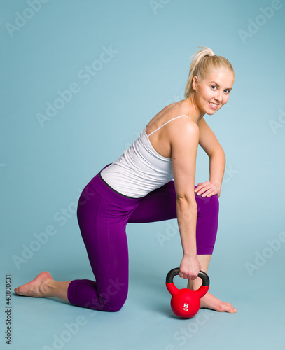 Photo: Girl and kettlebell Girl and kettlebell
