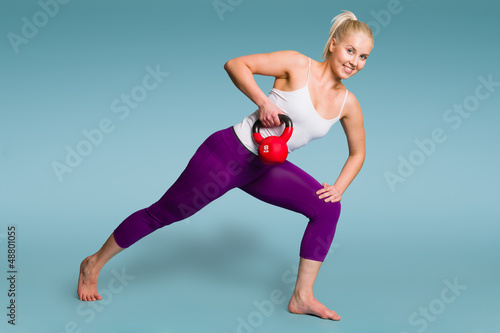 Photo: Girl and kettlebell Girl and kettlebell