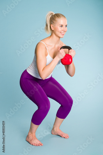 Photo: Girl and kettlebell Girl and kettlebell