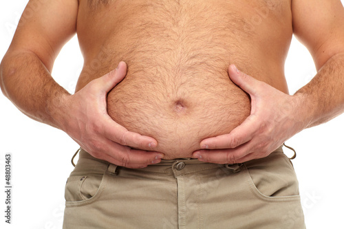 Photo: Fat man with a big belly. Fat man with a big belly.