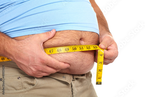 Photo: Fat man with a big belly. Fat man with a big belly.