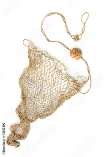 Photo: Fishing net on a white background. Fishing net on a white background.